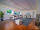 Finished basement with recessed lights and a cozy sitting area at 317 Belwood Dr, Belmont, NC 28012