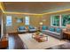 Bright living room features hardwood floors, a plush rug, and recessed lighting at 317 Belwood Dr, Belmont, NC 28012