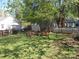 Large backyard with fire pit and seating, great for outdoor entertaining and relaxation at 443 Silversmith Ln # 16, Charlotte, NC 28270