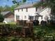 Spacious backyard featuring ample seating, barbecue, and a well-maintained lawn at 443 Silversmith Ln # 16, Charlotte, NC 28270