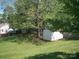 Large backyard with mature trees, shed, and space for entertaining at 443 Silversmith Ln # 16, Charlotte, NC 28270