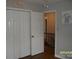 Bright bedroom featuring ample closet space and a charming view into the upstairs hallway at 443 Silversmith Ln # 16, Charlotte, NC 28270