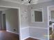 Dining area featuring vinyl floors, decorative wall shelves, and access to the kitchen at 443 Silversmith Ln # 16, Charlotte, NC 28270