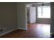 Open dining area features hardwood floors and seamless flow to the kitchen at 443 Silversmith Ln # 16, Charlotte, NC 28270