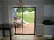 Kitchen patio area with a brick-paved area and slider doors at 443 Silversmith Ln # 16, Charlotte, NC 28270