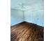 Bright bedroom featuring wood-look floors and a large closet at 443 Silversmith Ln, Charlotte, NC 28270