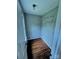 Walk-in closet with wood-look floors, window, and wire shelving at 443 Silversmith Ln, Charlotte, NC 28270