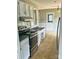 Functional kitchen with stainless steel appliances and white cabinets at 443 Silversmith Ln, Charlotte, NC 28270