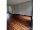 Spacious living room with new laminate flooring and lots of natural light at 443 Silversmith Ln, Charlotte, NC 28270