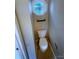 Small bathroom featuring a toilet and a decorative window, offering natural light and a unique touch at 443 Silversmith Ln, Charlotte, NC 28270