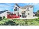Exterior showing a well-maintained backyard with deck and patio area for entertaining at 7925 Woodmere Dr, Harrisburg, NC 28075