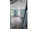 A bedroom with wood-look flooring and natural light coming in at 417 Stonewall S Ave, Rock Hill, SC 29730