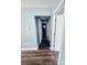 Hallway with wood-look flooring and white doors at 417 Stonewall S Ave, Rock Hill, SC 29730