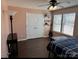 Bedroom with a ceiling fan, hard wood floors and large closed with 2 doors at 4519 S Potter Rd, Monroe, NC 28112