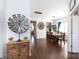 Open-concept dining room featuring hardwood floors and abundant natural light, perfect for entertaining at 4519 S Potter Rd, Monroe, NC 28112
