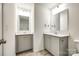 Bathroom featuring dual sinks, framed mirrors, modern fixtures at 558 Dulaney Dr, Fort Mill, SC 29708