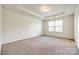 Bedroom featuring neutral walls, carpet flooring and a window at 558 Dulaney Dr, Fort Mill, SC 29708