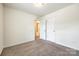 Bedroom features neutral walls, carpet flooring, and en suite access at 558 Dulaney Dr, Fort Mill, SC 29708