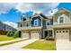 Stylish townhome exterior, showcasing a well-landscaped front and garage at 558 Dulaney Dr, Fort Mill, SC 29708