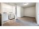 Laundry room with washer and dryer hookups and shelving at 558 Dulaney Dr, Fort Mill, SC 29708