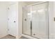 Shower featuring glass enclosure, and modern fixtures at 558 Dulaney Dr, Fort Mill, SC 29708