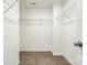 Empty walk-in closet with wire shelving and neutral walls at 558 Dulaney Dr, Fort Mill, SC 29708