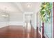 Spacious foyer with hardwood floors, white trim, and an open view into the formal living and dining areas at 1034 Currituck Way, York, SC 29745