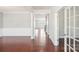 Expansive foyer featuring hardwood flooring, with views to the living and dining area through white trim at 1034 Currituck Way, York, SC 29745