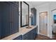 Bathroom featuring a granite countertop, under-mount sink, and glass-enclosed shower at 111 Moors End Loop, Mooresville, NC 28117