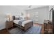 Cozy bedroom with hardwood floors and a comfortable bed at 111 Moors End Loop, Mooresville, NC 28117