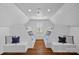 Bright bedroom with built-in bunk beds, wood flooring, and a window with natural light at 111 Moors End Loop, Mooresville, NC 28117