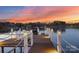 Scenic lake view from the private dock, perfect for boating and enjoying the sunset with lounge chairs at 111 Moors End Loop, Mooresville, NC 28117