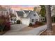 Charming home exterior with a three-car garage, well-manicured landscaping, and inviting curb appeal at 111 Moors End Loop, Mooresville, NC 28117
