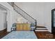 Grand foyer featuring a staircase, console table with decor, and stylish furnishings with modern style at 111 Moors End Loop, Mooresville, NC 28117