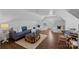 Upstairs living room with bunk beds, a sofa, and wood floors at 111 Moors End Loop, Mooresville, NC 28117