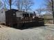 A charming RV featuring a spacious deck for outdoor entertainment and relaxation in a tranquil setting at 113 Larboard Trl # B36/37, Mount Gilead, NC 27306