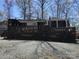 A charming RV featuring a spacious deck for outdoor entertainment and relaxation in a tranquil setting at 113 Larboard Trl # B36/37, Mount Gilead, NC 27306