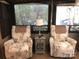 Relax in these floral reclining armchairs with a convenient side table at 113 Larboard Trl # B36/37, Mount Gilead, NC 27306