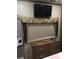 Living room with TV, window, dresser, and other accessories at 113 Larboard Trl # B36/37, Mount Gilead, NC 27306