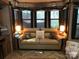 Bright living room with sofa, throw pillows, side tables, and accent decor at 113 Larboard Trl # B36/37, Mount Gilead, NC 27306