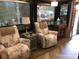 RV living room featuring two recliners, side table, and a view of the outdoors at 113 Larboard Trl # B36/37, Mount Gilead, NC 27306