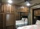 Main bedroom featuring mirrored closet and a bed with a floral quilt at 113 Larboard Trl # B36/37, Mount Gilead, NC 27306