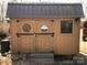 Charming outdoor storage shed with double doors and window at 113 Larboard Trl # B36/37, Mount Gilead, NC 27306