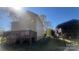 Back of house features a large deck and fenced-in yard at 1134 Riverside Dr, Charlotte, NC 28214