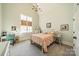 Cozy bedroom offers a comfortable space with soft light, carpet, and tranquil decor at 115 Stonewall Beach Ln, Mooresville, NC 28117