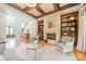 Elegant living area with fireplace, hardwood floors, and stylish furniture at 115 Stonewall Beach Ln, Mooresville, NC 28117