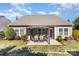 Spacious backyard with a paved patio, perfect for outdoor dining and gatherings at 116 Water Ski Dr, Statesville, NC 28677
