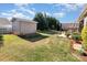 Well-maintained backyard with a storage shed and lush green lawn at 116 Water Ski Dr, Statesville, NC 28677
