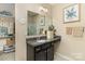 The main bathroom features a vanity, mirror, and walk-in closet at 116 Water Ski Dr, Statesville, NC 28677