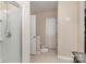 Bright bathroom offers a walk-in shower with glass door and neutral paint at 116 Water Ski Dr, Statesville, NC 28677